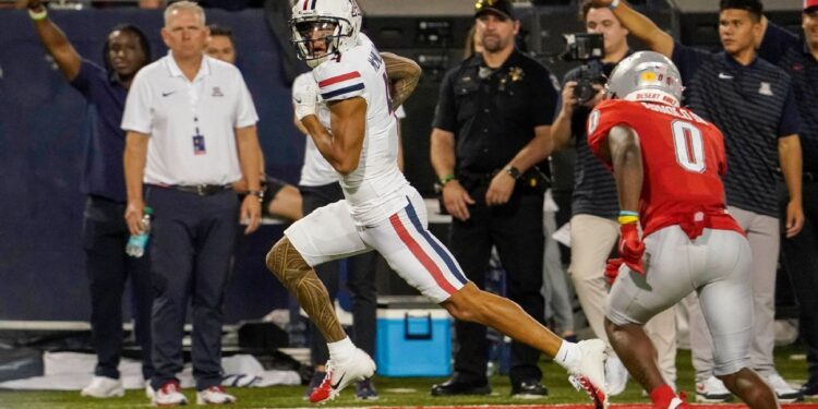 Arizona’s Tetairoa McMillan has 304 yards, 4 TDs in blowout win