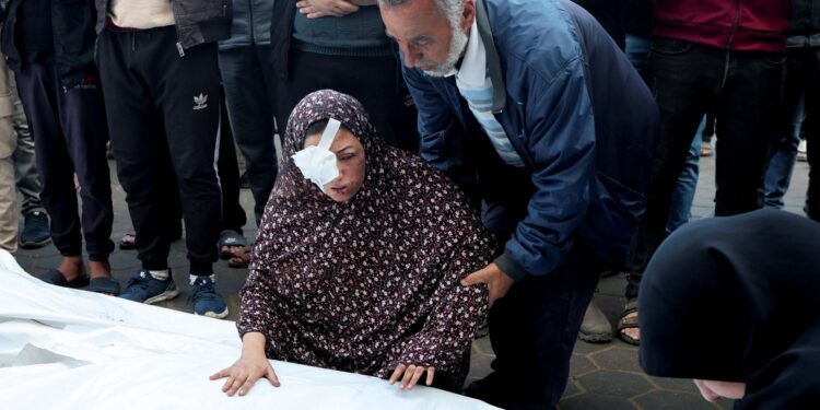 Israeli attacks kill dozens across Gaza, including 15 guarding aid trucks | Gaza News