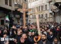Protests in Syria after Christmas tree set alight