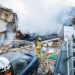 Four dead, more feared missing after flat explosions