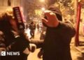 Moment journalist and cameraman attacked by masked men in Georgia