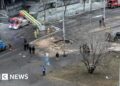 Four killed in strike on central Kyiv, officials say