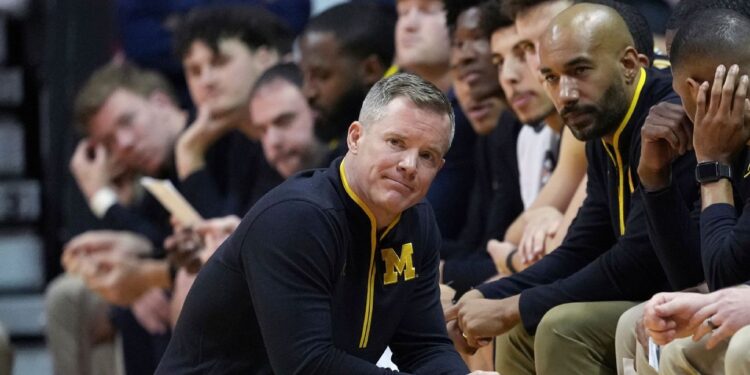 ‘I love being at Michigan,’ says May when asked about Indiana job