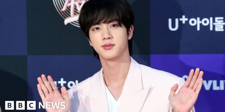 Japanese woman under investigation for kissing Jin