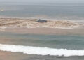 Car swept out to sea by floods on Spanish island