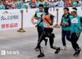 China races robots against humans in Beijing half marathon