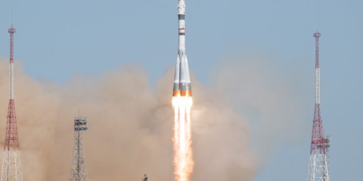 Russian and US crew blasts off in Soyuz rocket bound for ISS | Space News
