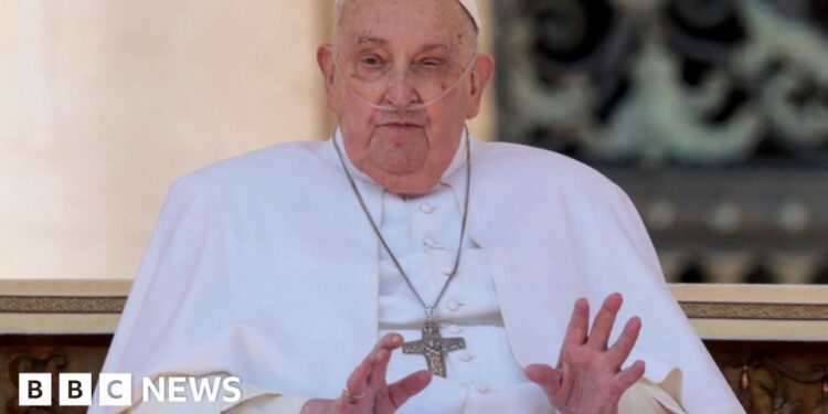 Pope Francis waves to crowd in first public appearance since leaving hospital