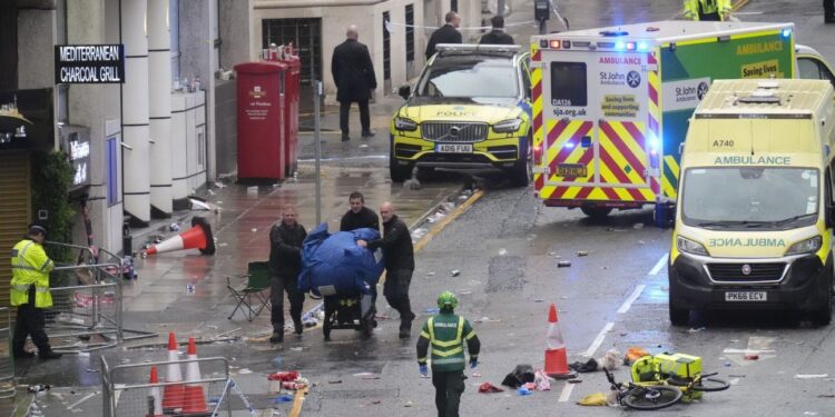 Police arrest man after car collides with Liverpool parade crowd