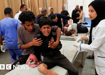 Israeli forces kill 51 Palestinians waiting for flour at Gaza aid site, witnesses and rescuers say