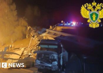 At least three dead after Russian bridge collapses onto train