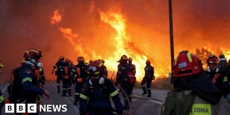Wildfires rage on Greek island