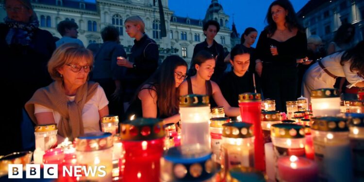 Austrians hold minute of silence and vigil for 10 victims of school shooting