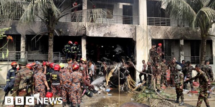 At least 19 dead after air force jet crashes into school