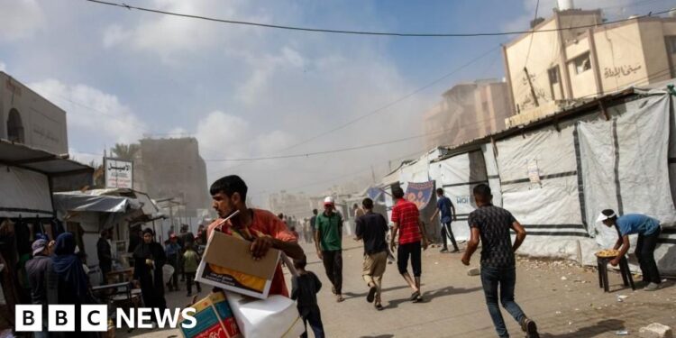 Five journalists among 20 killed in Israeli strike on hospital, Gaza officials say