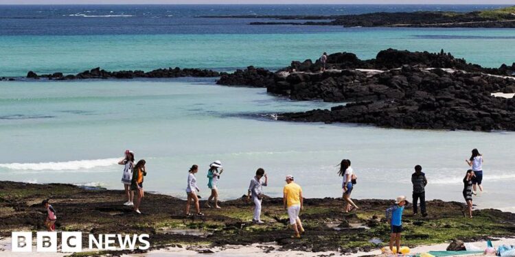 South Korean police tell tourists on holiday island Jeju to behave