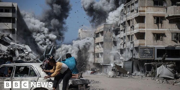 Israeli strikes kill dozens in Gaza including civilians seeking aid, health workers say