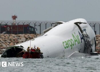Emirates cargo plane skids off runway into sea at Hong Kong International Airport