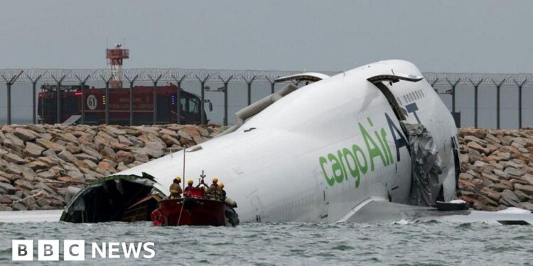 Emirates cargo plane skids off runway into sea at Hong Kong International Airport
