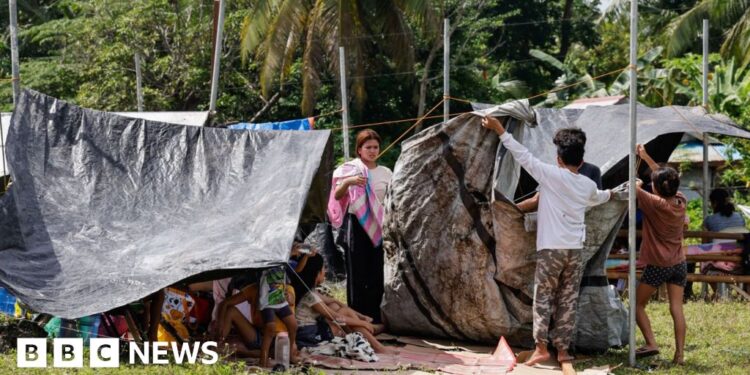 Scared survivors sleep in fields as death toll rises