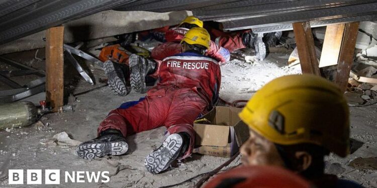 Indonesia rescuers race to find survivors after school collapse traps dozens