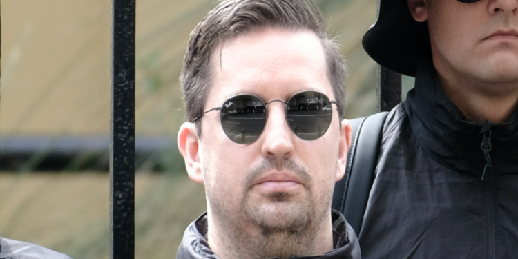 South African man seen at neo-Nazi rally has Australian visa revoked