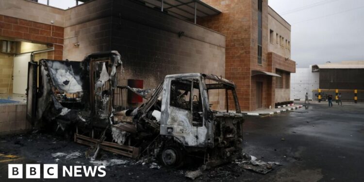 Israeli settlers set fire to Palestinian warehouse and land as West Bank attacks surge