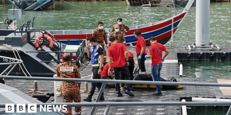 Malaysia officials recover more bodies from capsized migrant boat