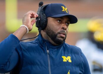 Ex-Michigan coach Moore detained by police after firing