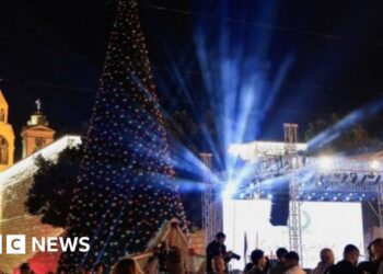 Bethlehem Christmas tree lights up for first time since start of Gaza war