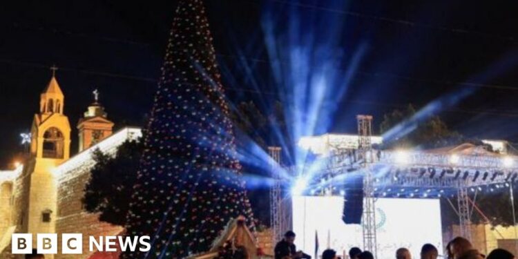 Bethlehem Christmas tree lights up for first time since start of Gaza war