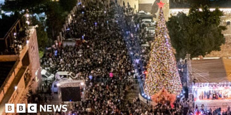 Bethlehem Christmas tree lights up for first time since Gaza war