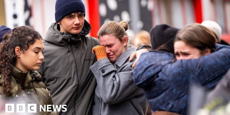 Swiss open criminal case against owners of ski resort bar after deadly fire