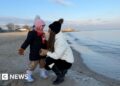 Under fire from the sea, Ukrainian families in Odesa try to escape Russian barrage