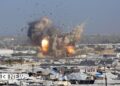 Israeli air strikes kill at least 32 Palestinians in Gaza, rescue officials say