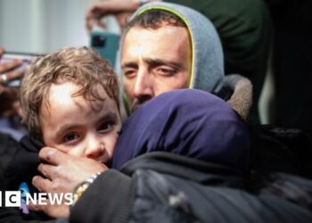 Gazans returning through Rafah crossing describe checks by Palestinian militia