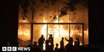 'I can't breathe any more': Inside the night a mob burned a newspaper