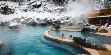 This 140-year-old Hot Springs Resort Has Mountain Views, Silica-rich Waters, and Riverside Soaking Pools