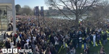 Thousands of students rally after woman's explicit images circulated