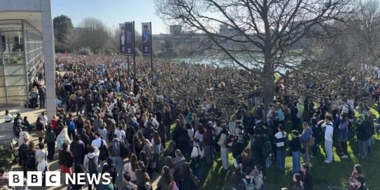 Thousands of students rally after woman's explicit images circulated