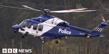 Shock, sadness and relief in town at centre of Australia's seven-month police manhunt