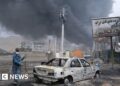 'Night turned into day': Iranians tell of strikes on oil depots