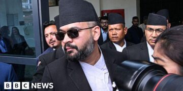 Nepal swears in ex-rapper as new prime minister