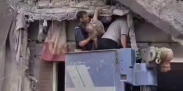 Rescue workers rush to save lives after south Tehran missile strike | Conflict