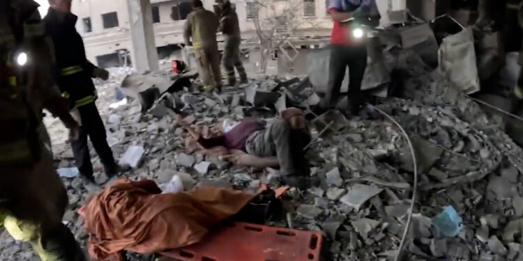 Iranian rescuers save two civilians from rubble after US-Israeli strikes | US-Israel war on Iran