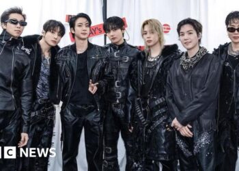 BTS battle torrential rain to kick off $1bn world tour