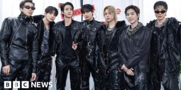 BTS battle torrential rain to kick off $1bn world tour