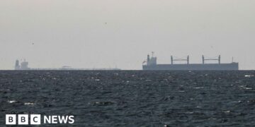 Strait of Hormuz closed again, Iran says, as ships attacked