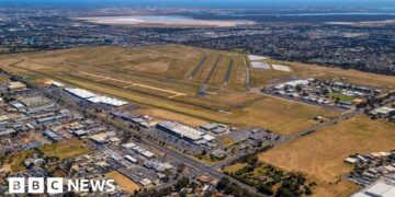 Two dead after small plane crashes into Australia airport hangar