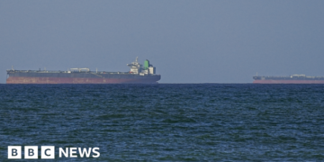 Iran says it has seized two ships in Strait of Hormuz after vessels attacked